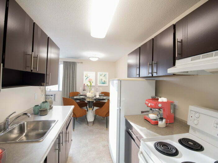 dining area, bedroom in a 1 bedroom unit at Newdale Apartments in Winnipeg, Manitoba