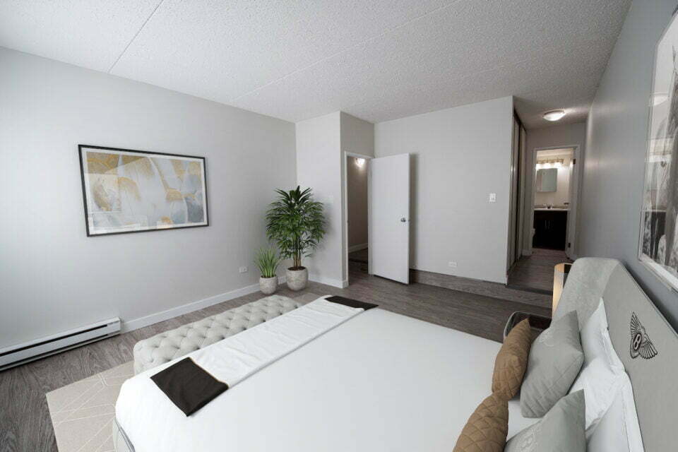 chambre à coucher dans un logement de deux chambres à coucher aux appartements Armadale Hollows à Winnipeg, MB