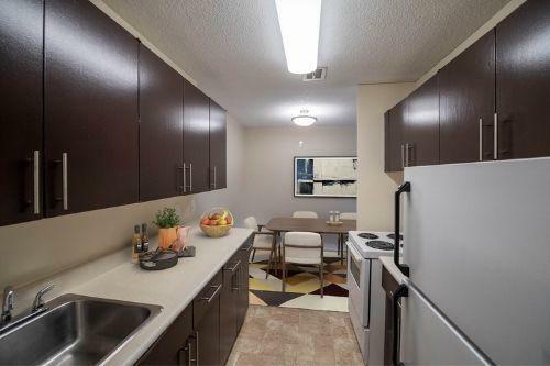 a kitchen with dining table